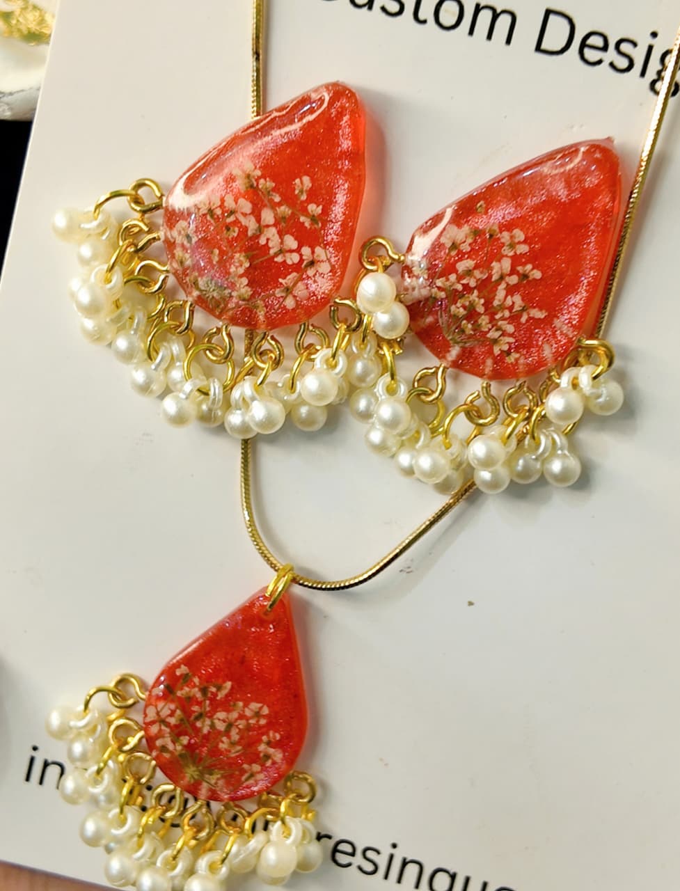Red, Gold & White Resin Earrings and Pendant Set with White Anales Flower & Pearl Hangings – Elegant Artisan Design